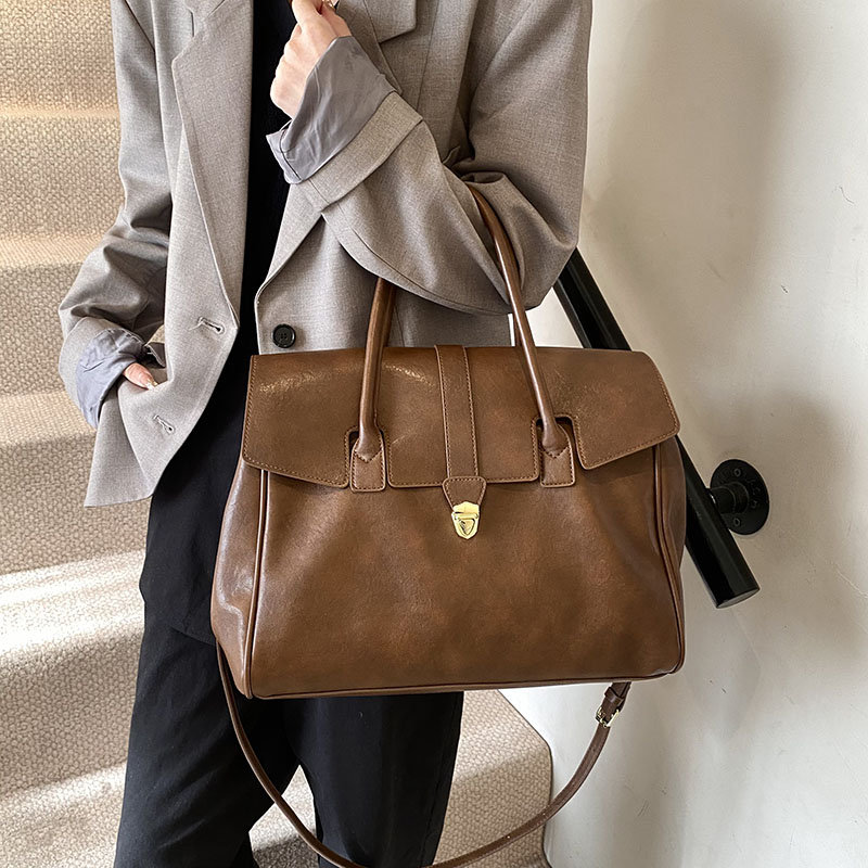 MOODS Branded Luxury Top-handl - огляд і ціна Luxury Bags Consignment